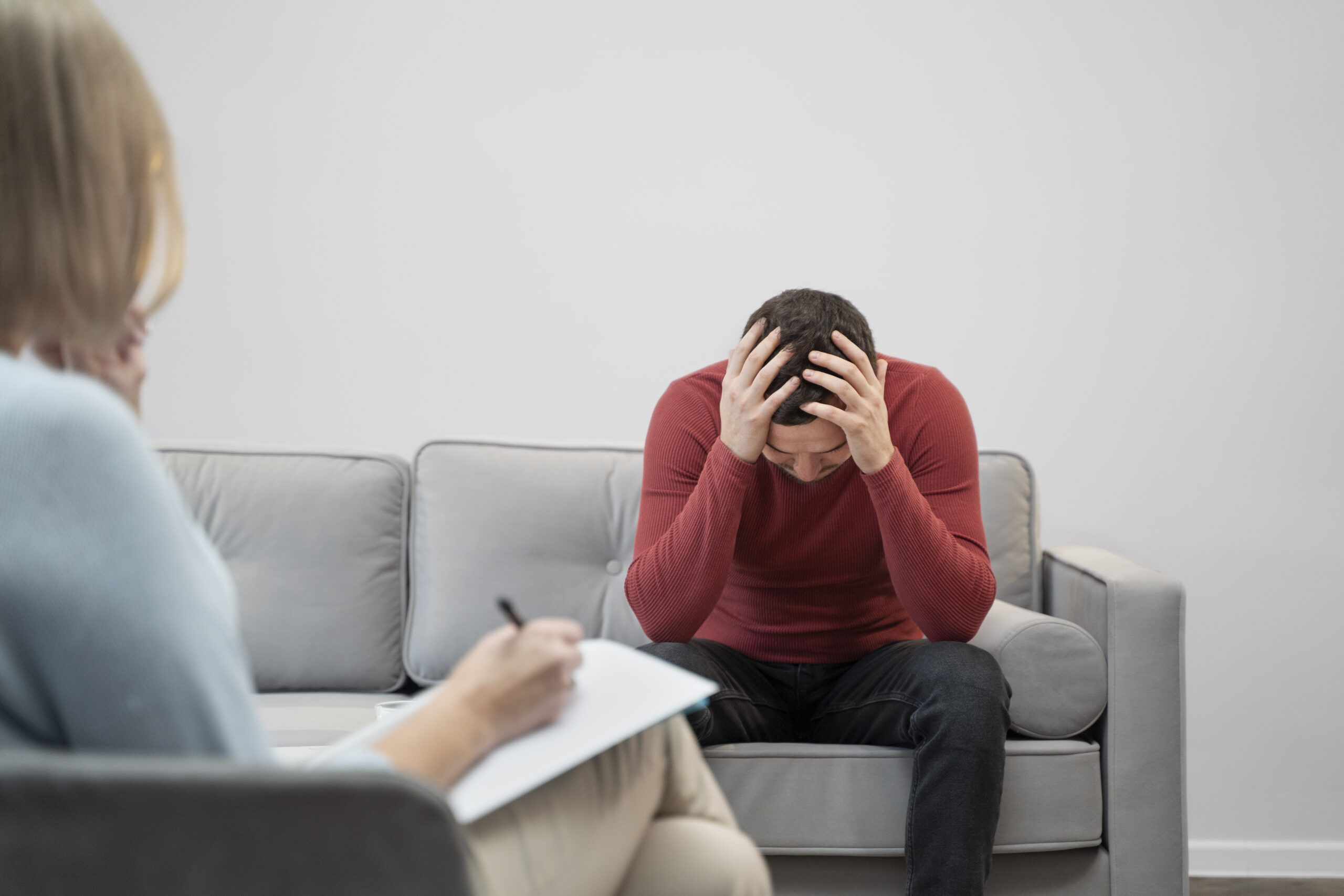 person suffering from ptsd psychologist 1 scaled